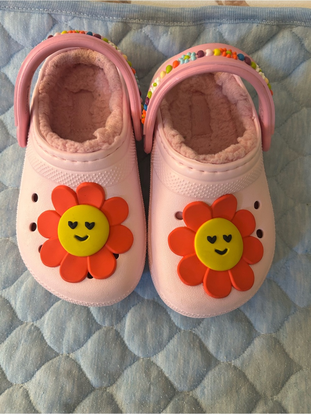 CROCS Kids Pink Clog Slippers with Orange Flower Charm